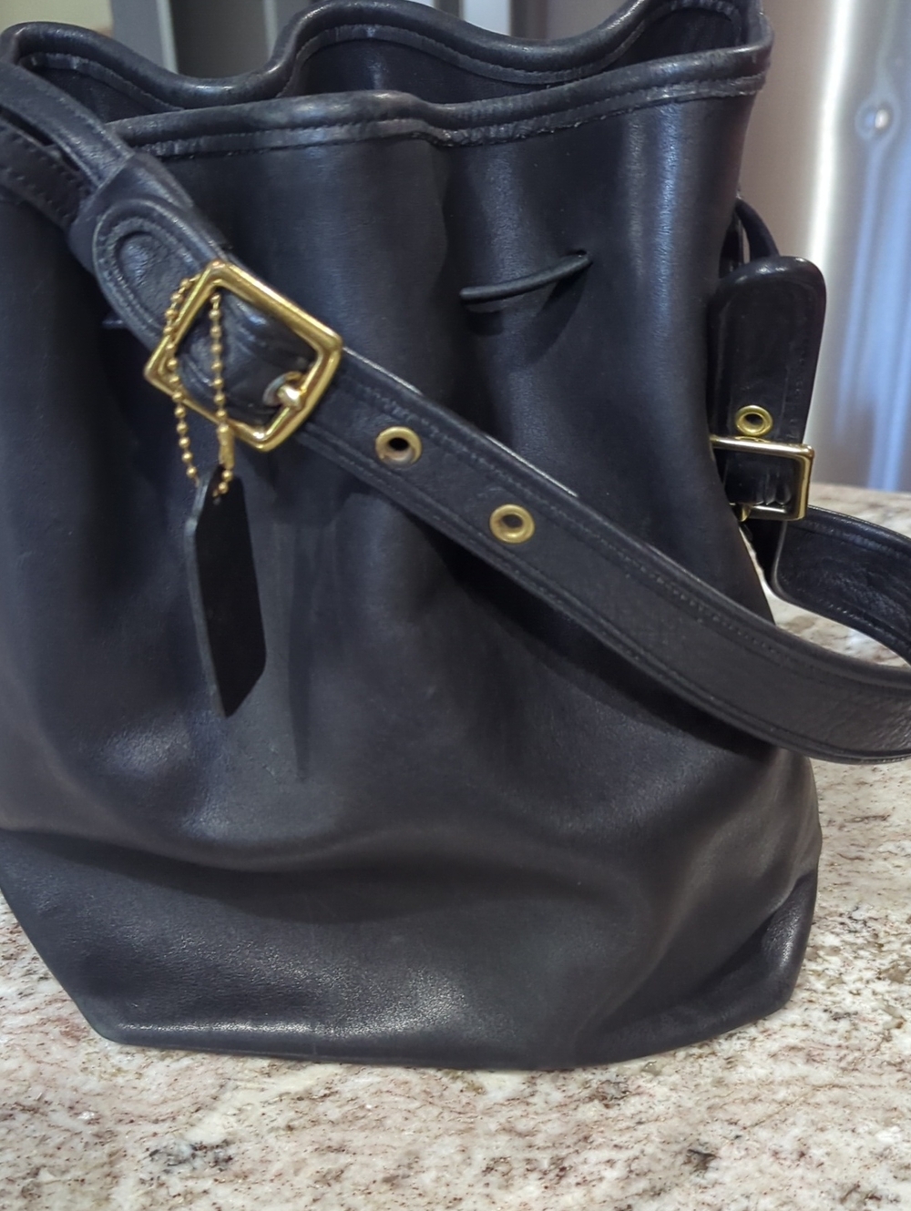 Coach Black Leather Drawstring Shoulder Bag with Gold-Tone Hardware